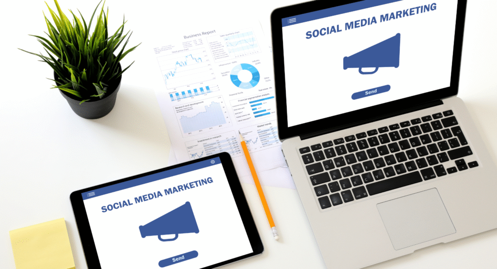 A laptop and a tablet with social media advertising written on it